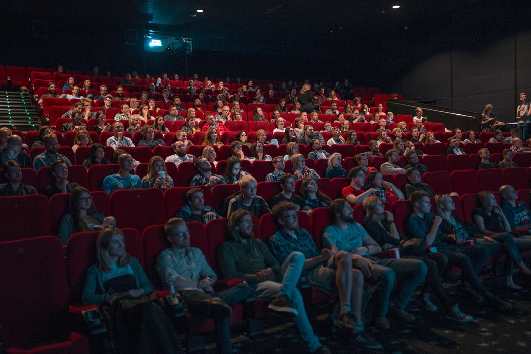 People_in_movie_theater_hearing_loss