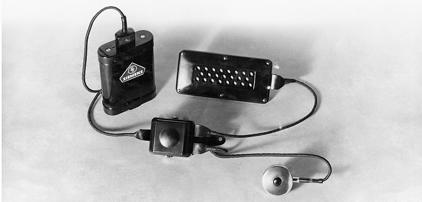 black-and-white-image-of-phonographer-amplifier-and-microphone