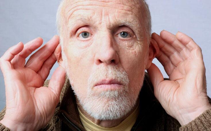 elizabethtown man frowns while bending ears forward and closed with fingers