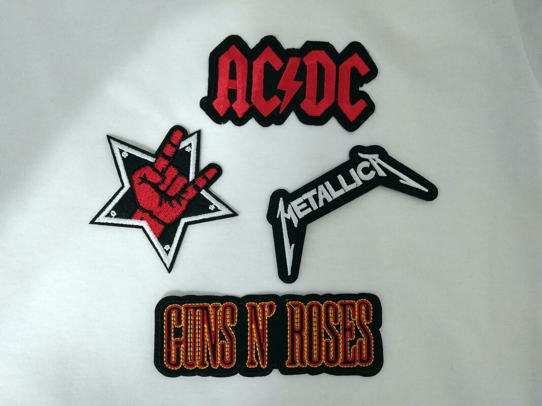 Three embroidered rock band patches for AC/DC, Metallica, and Guns N' Roses and a “rock on” hand symbol patch.