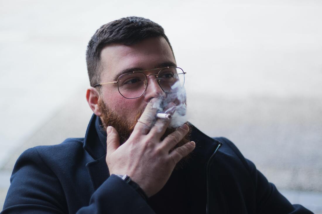 lancaster county man with beard and glasses has hearing loss due to smoking