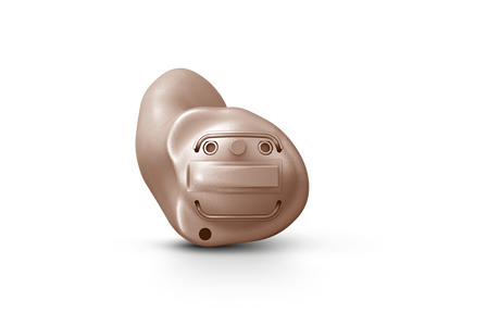 A custom molded, rexton, skin-toned invisible, in-the-ear or in-the-canal hearing aid.