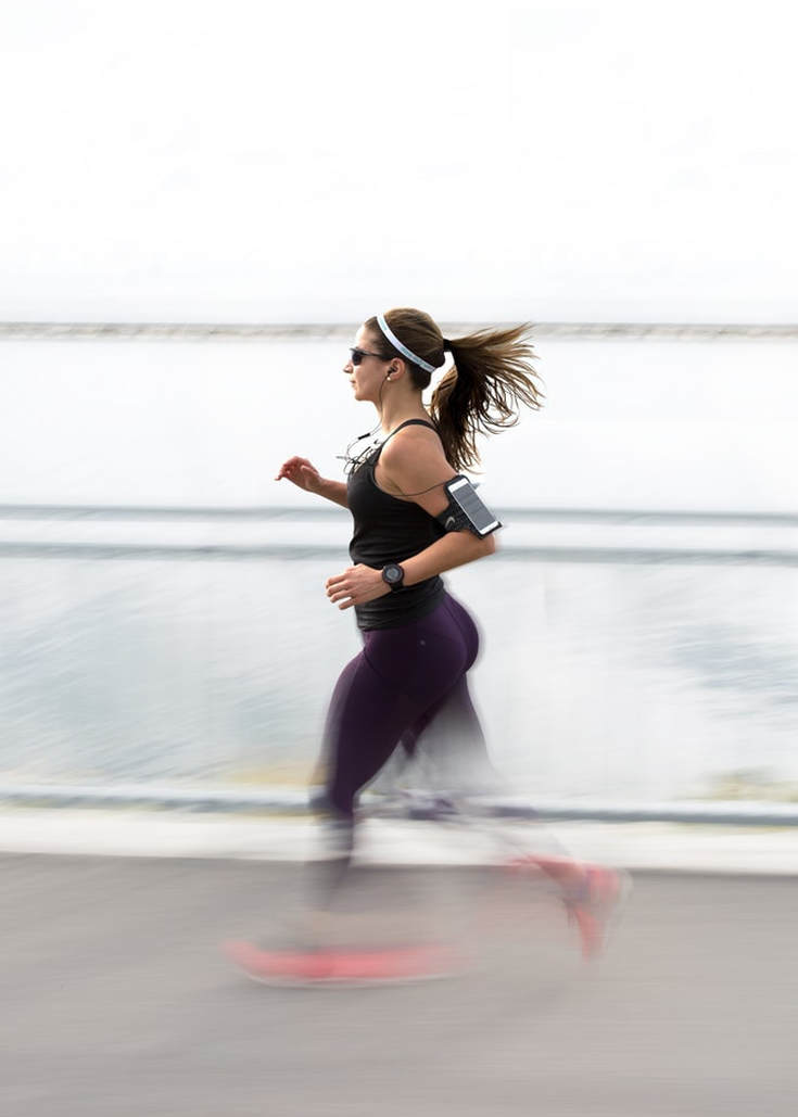 woman_running_and_feeling_motivated_to_combat_hearing_loss